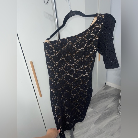 This cute one arm dress is really cute and never used. - Picture 3 of 3